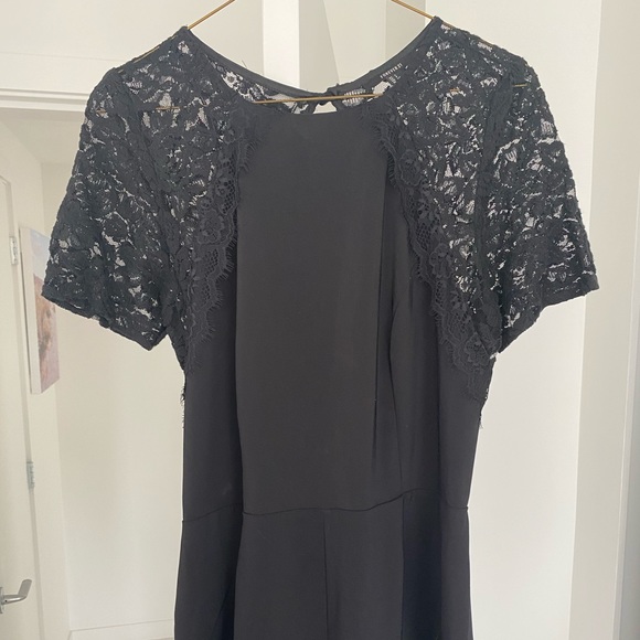 Black fancy romper - Picture 1 of 3